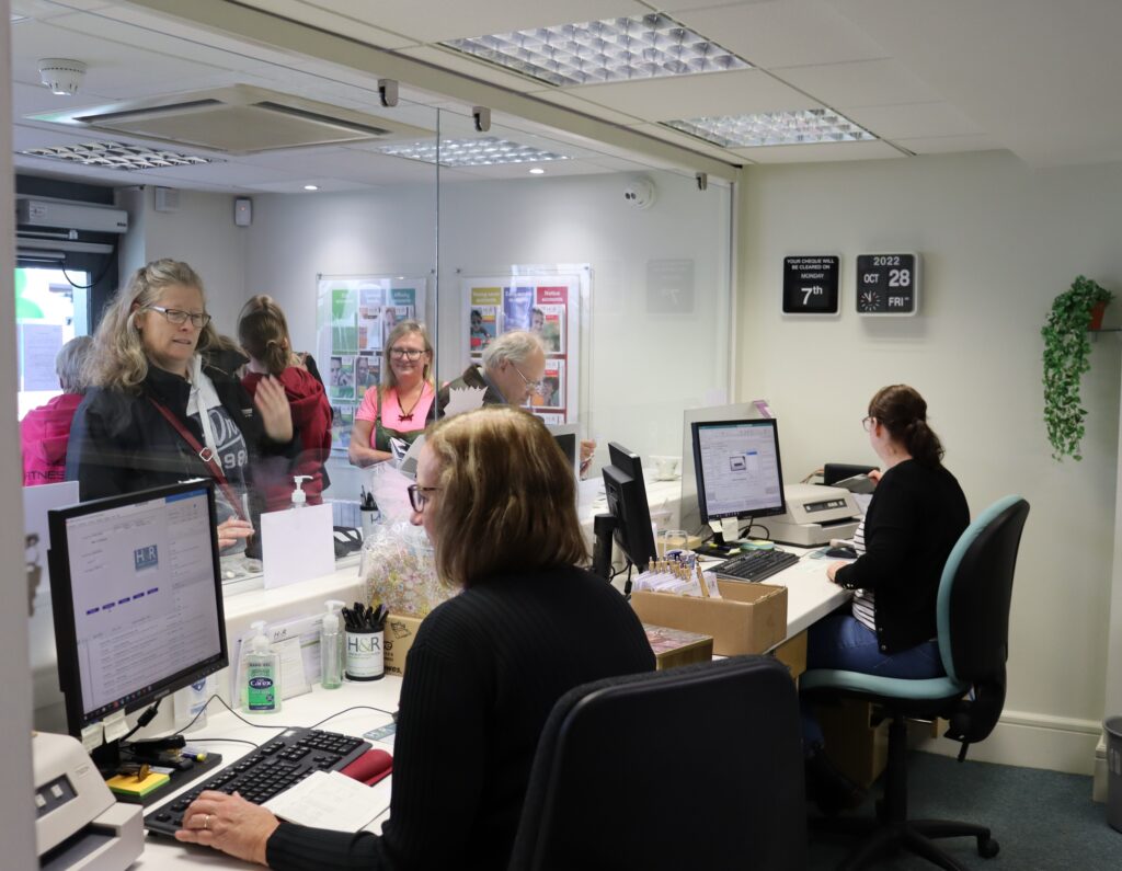 Members at the counter of the Lutterworth branch.