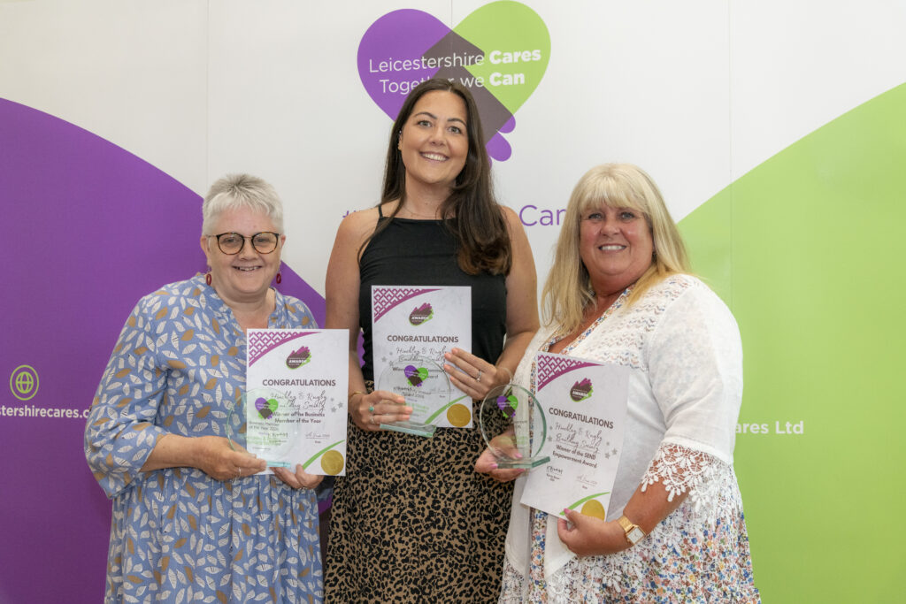 Denise, Jen and Bev proudly display the Society's awards received in 2026 at the ceremony